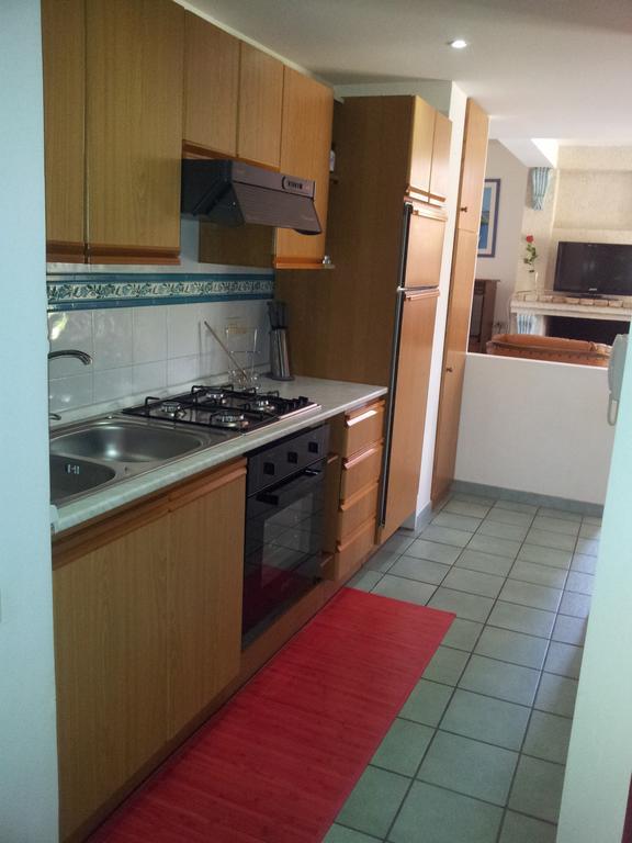 Casa Vacanze Villa Flumini Флуміні-ді-Кварту Номер фото