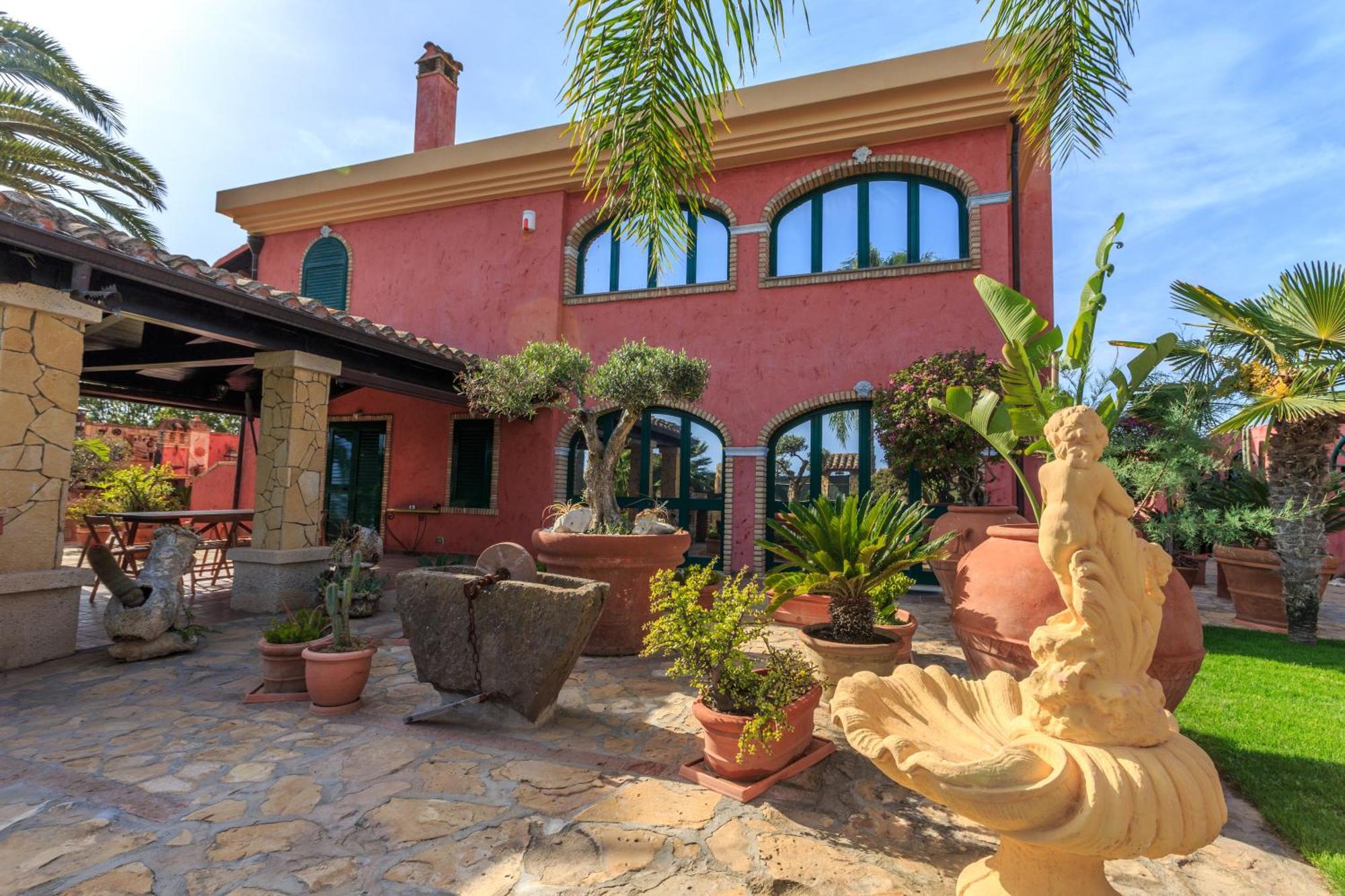 Casa Vacanze Villa Flumini Флуміні-ді-Кварту Екстер'єр фото