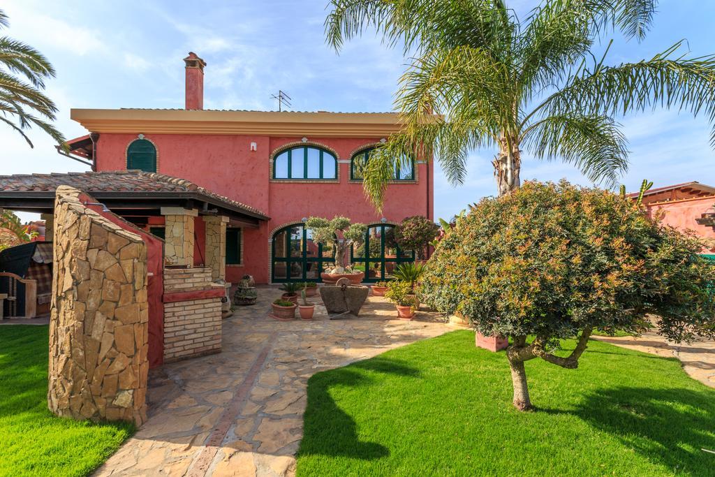 Casa Vacanze Villa Flumini Флуміні-ді-Кварту Екстер'єр фото