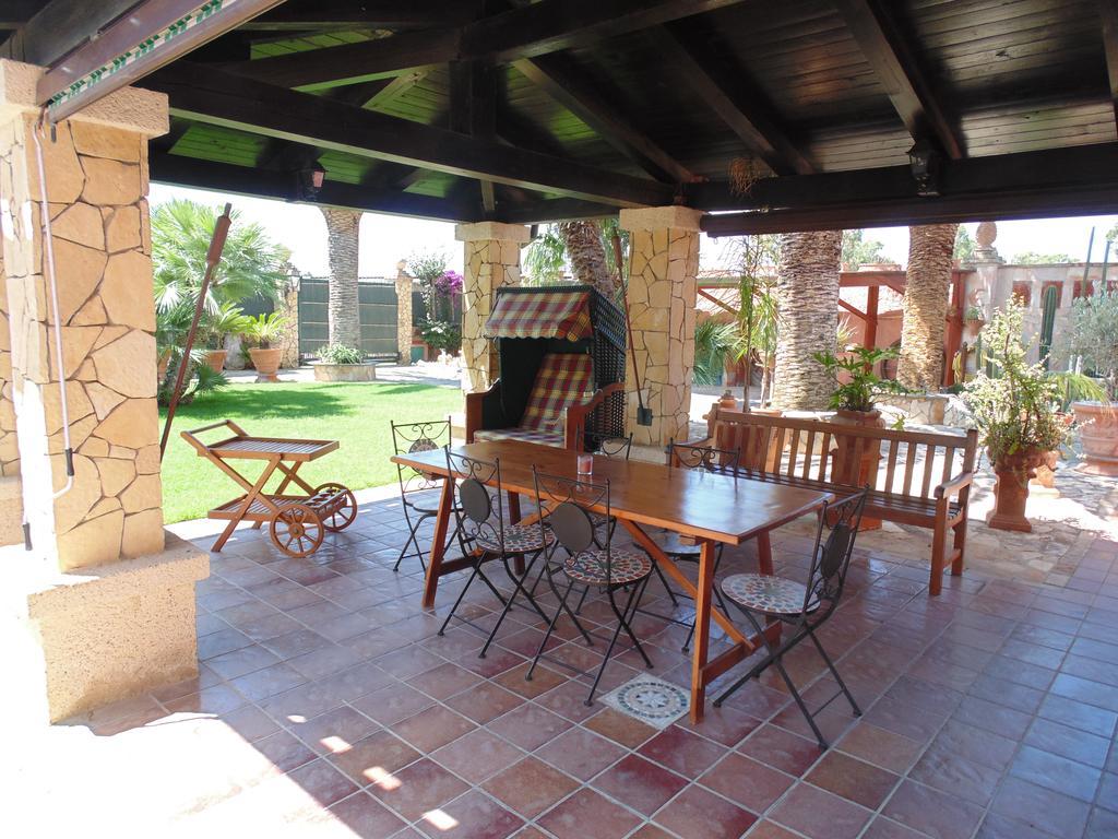 Casa Vacanze Villa Flumini Флуміні-ді-Кварту Екстер'єр фото